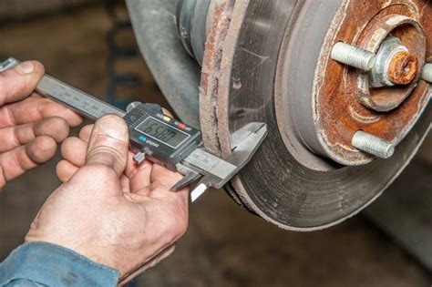 testing brake pads|your brakes need checking if.